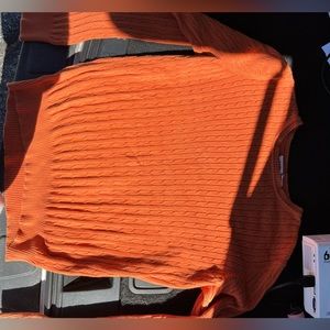 Orange never worn sweater. Obo